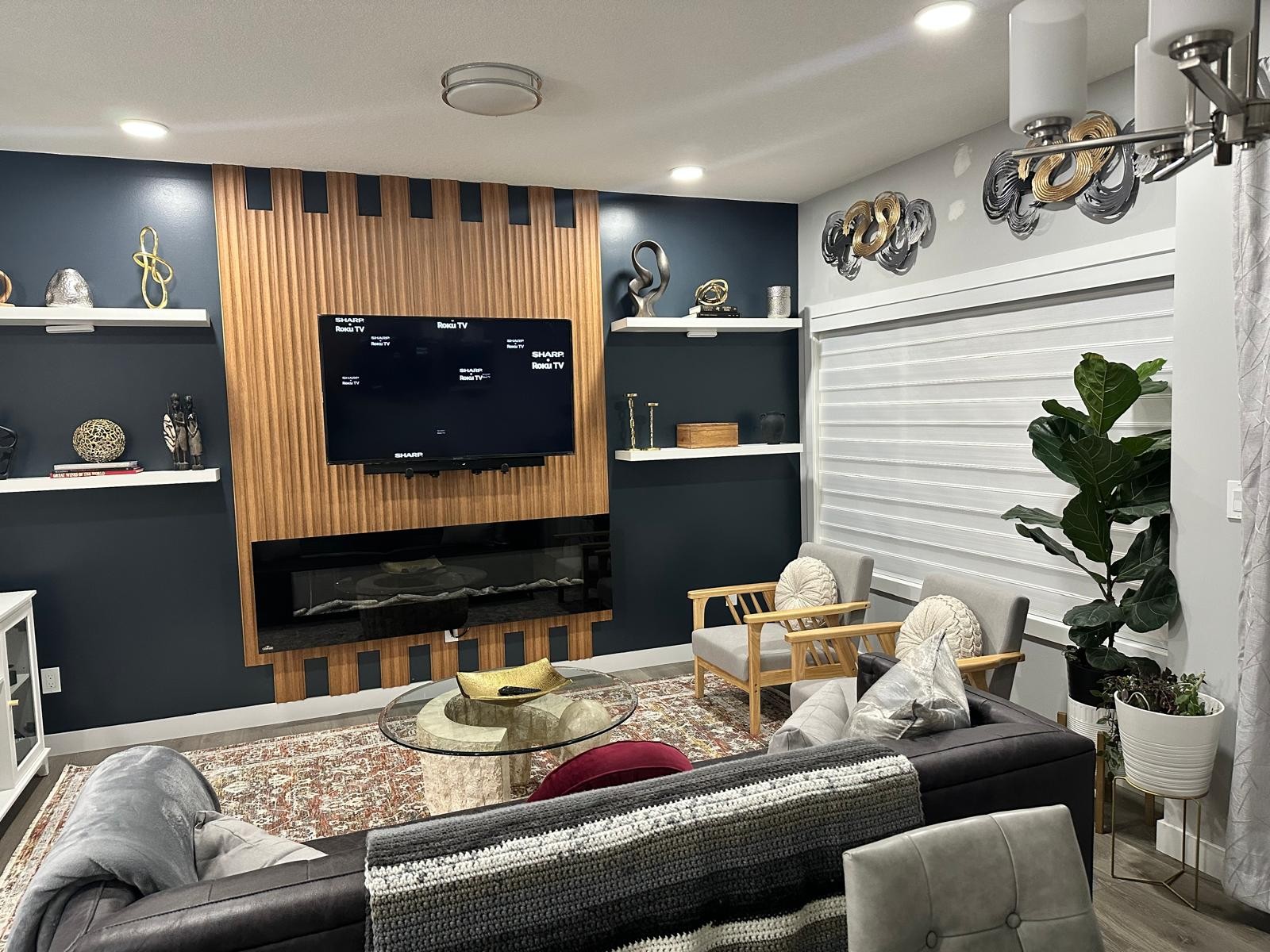 Navy Slat Media Wall — Edmonton interior design project